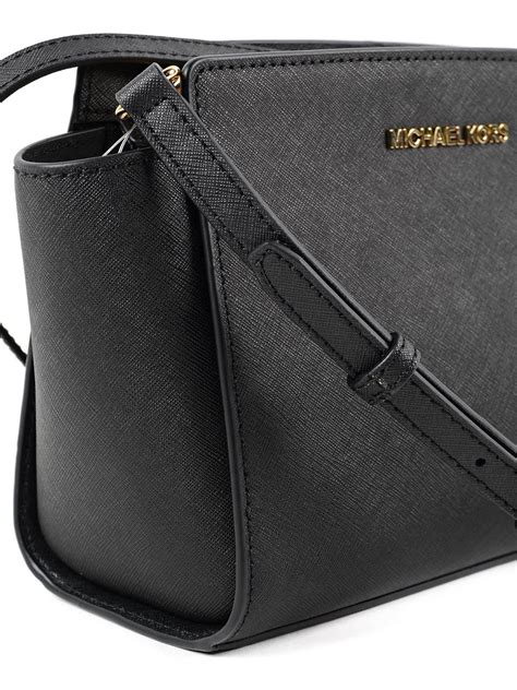 bandolera negra michael kors|michael kors official website.